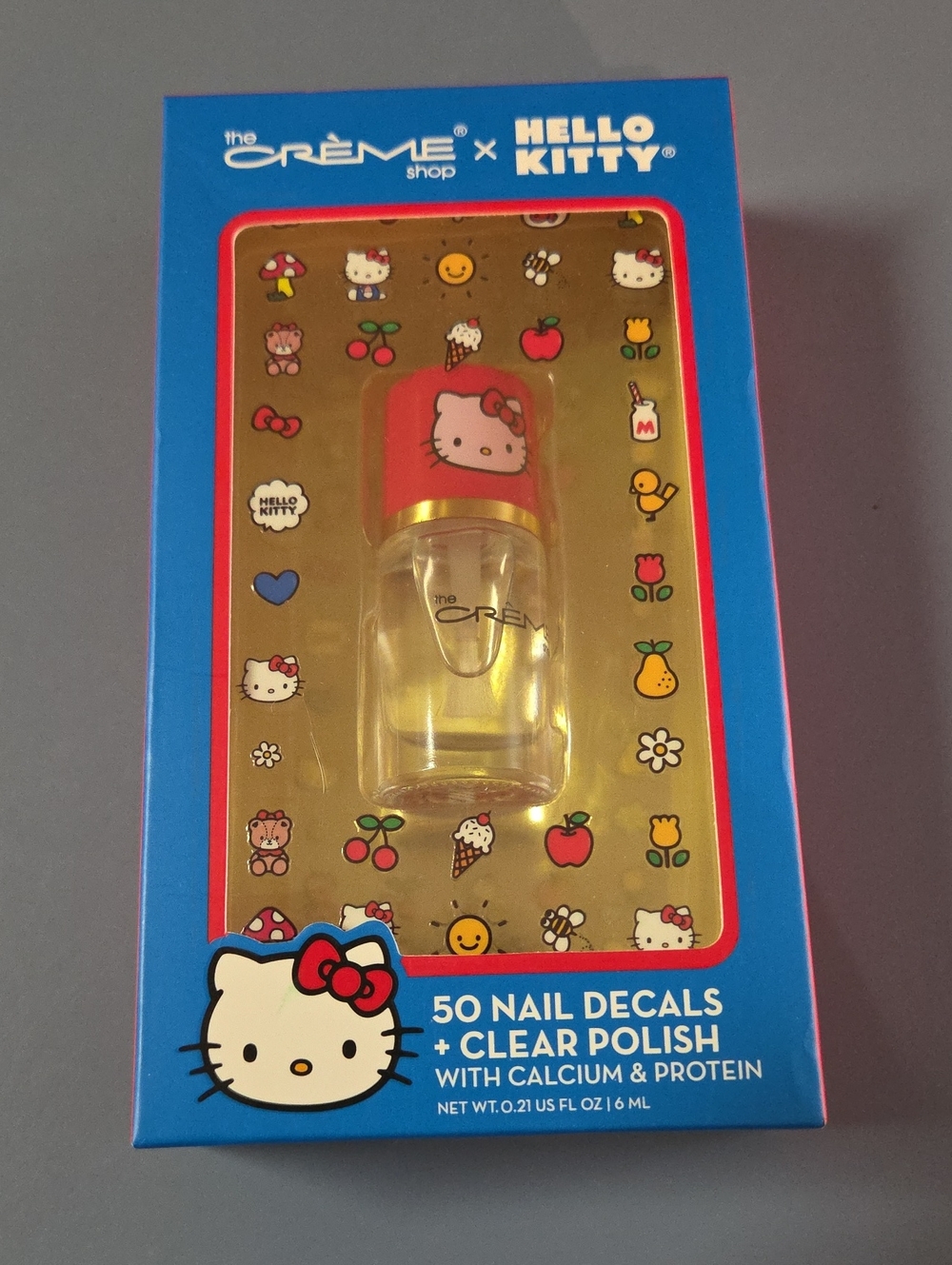 The Crème Shop x Hello Kitty Clear Nail Polish & 50 Nail Decals - Red Cap